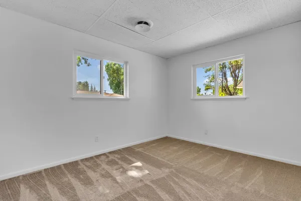 an empty room with windows