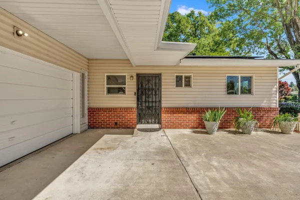 a view of a house with a patio