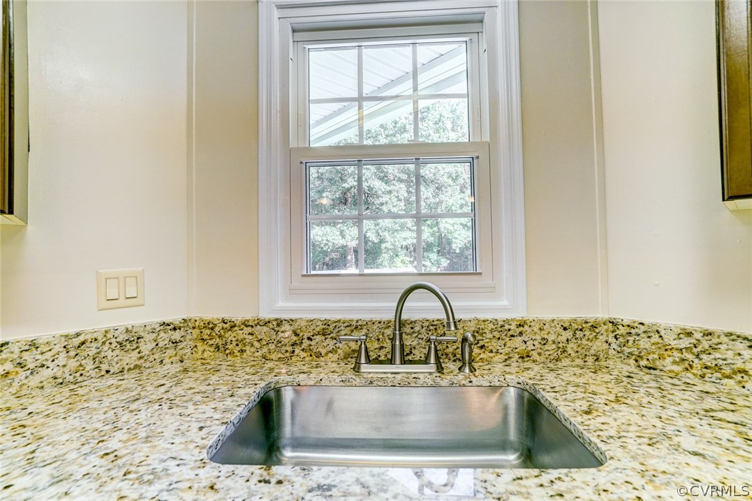 17684 Baltimore Road Dewitt, VA 23840 - Photo 13 of 42 a close view of a sink and tap