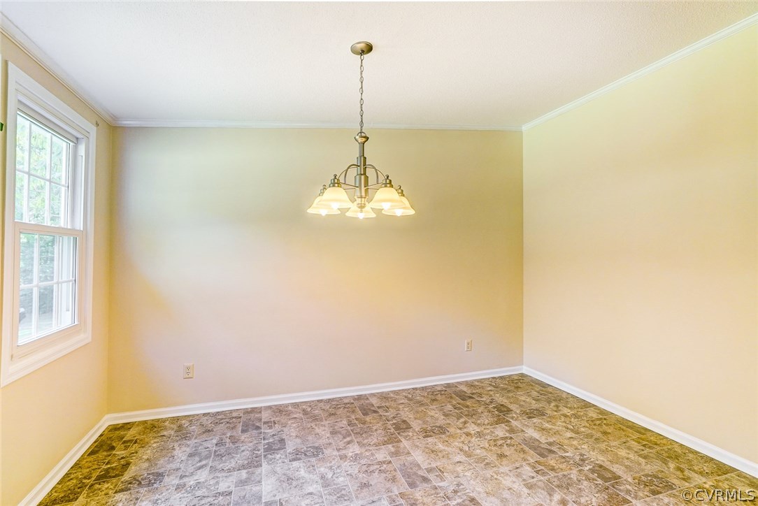 17684 Baltimore Road Dewitt, VA 23840 - Photo 14 of 42 a room with a chandelier