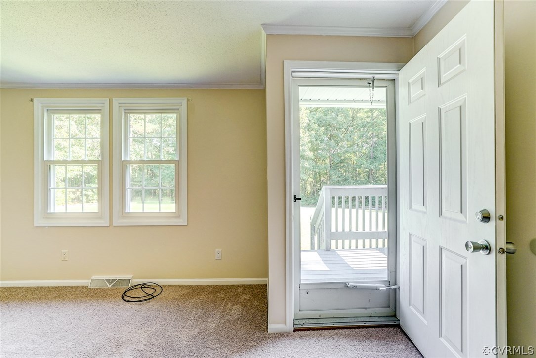 17684 Baltimore Road Dewitt, VA 23840 - Photo 15 of 42 a view of empty room with floor to ceiling window