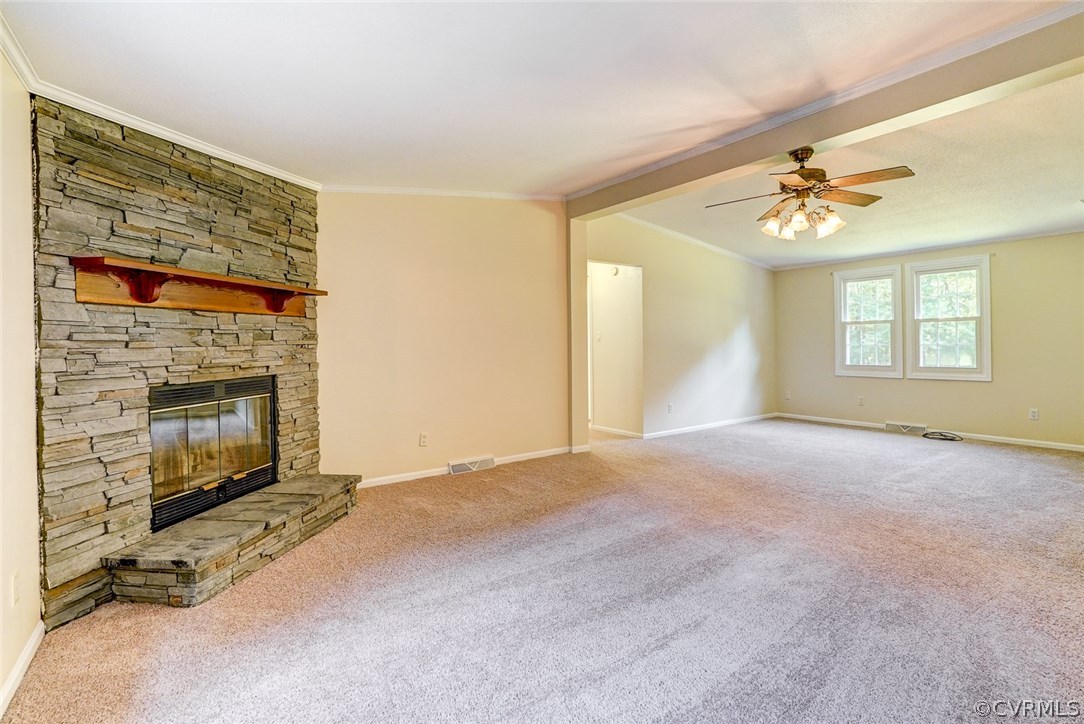 17684 Baltimore Road Dewitt, VA 23840 - Photo 18 of 42 a view of a livingroom with a fireplace and window