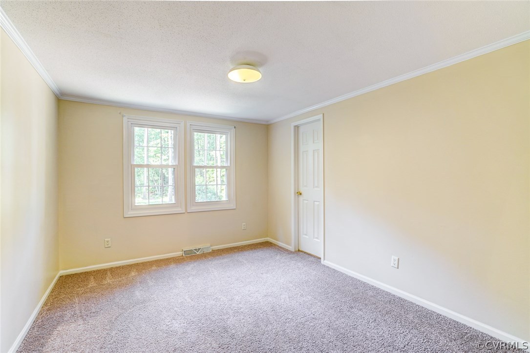 17684 Baltimore Road Dewitt, VA 23840 - Photo 24 of 42 a view of an empty room with a window