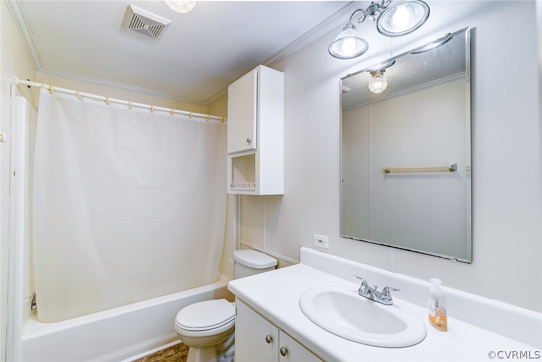 17684 Baltimore Road Dewitt, VA 23840 - Photo 25 of 42 a bathroom with a sink toilet and shower