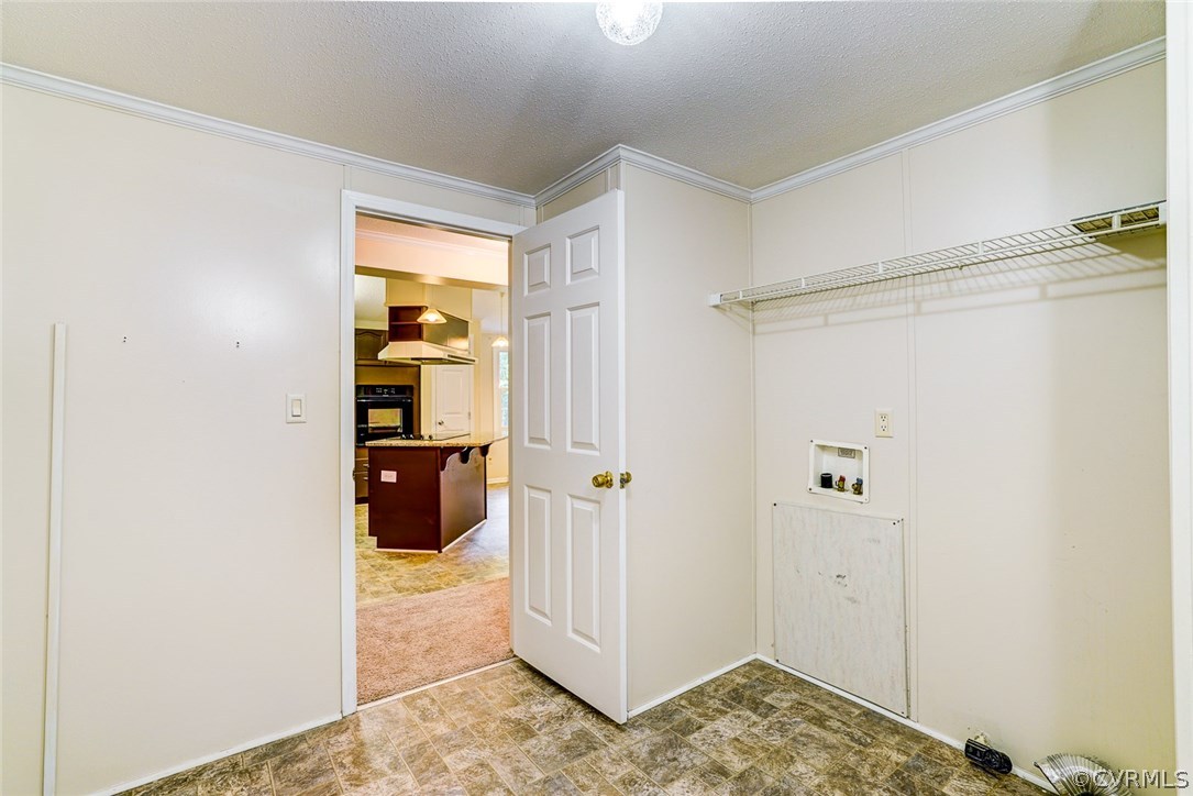17684 Baltimore Road Dewitt, VA 23840 - Photo 26 of 42 a view of a bedroom with wooden floor and a bathroom