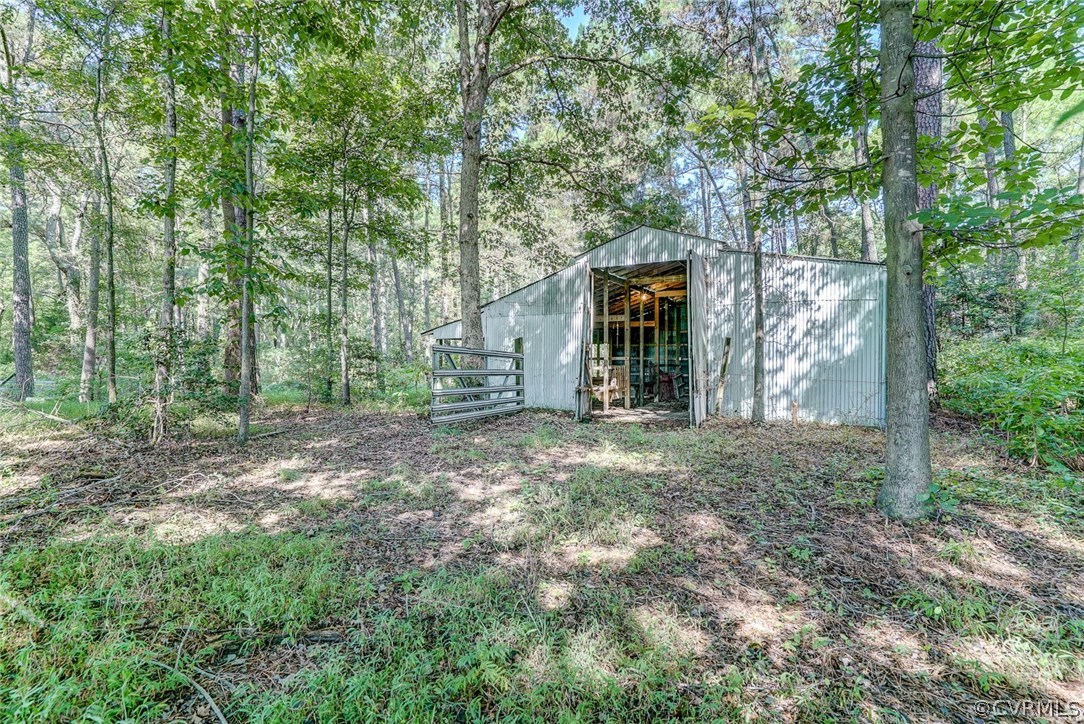 17684 Baltimore Road Dewitt, VA 23840 - Photo 35 of 42 a view of a house with backyard