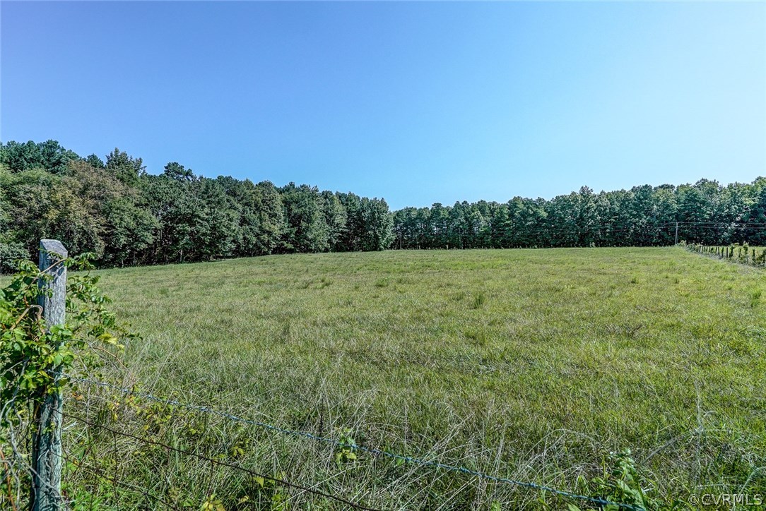 17684 Baltimore Road Dewitt, VA 23840 - Photo 40 of 42 a view of a field with trees in the background