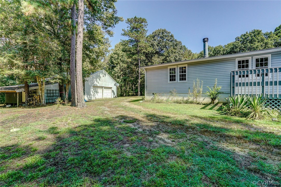 17684 Baltimore Road Dewitt, VA 23840 - Photo 5 of 42 a view of backyard of house with green space