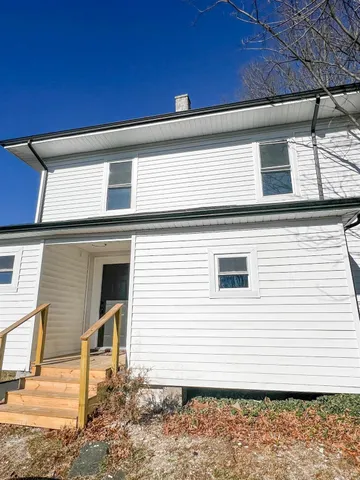 a view of a house with a patio