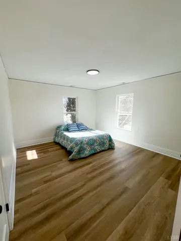 a view of parking garage with cars