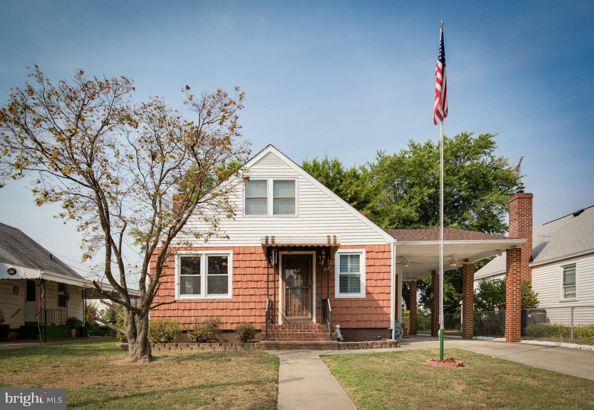 2604 Lynbrook Road Baltimore, MD 21222 - Photo 1 of 30 a front view of a house with a yard