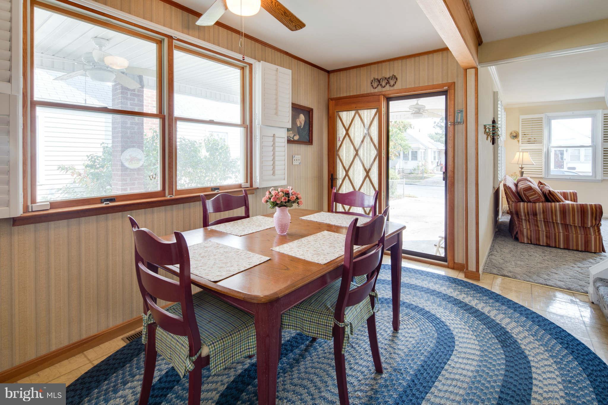 2604 Lynbrook Road Baltimore, MD 21222 - Photo 13 of 30 a view of a dining room with furniture window and outside view