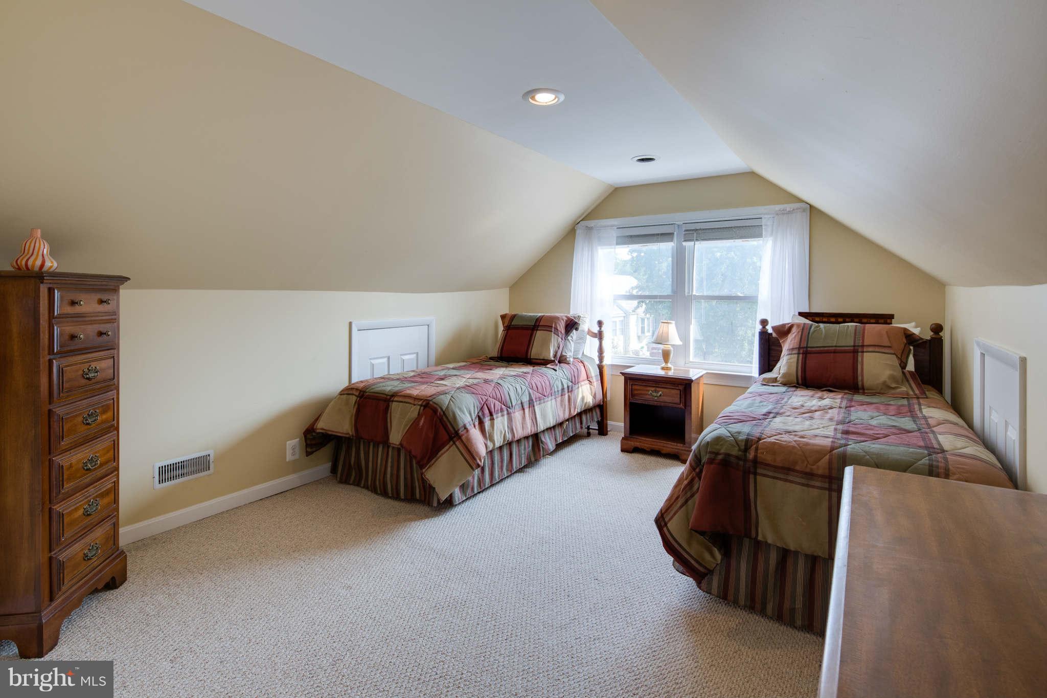 2604 Lynbrook Road Baltimore, MD 21222 - Photo 20 of 30 a bedroom with bed and window