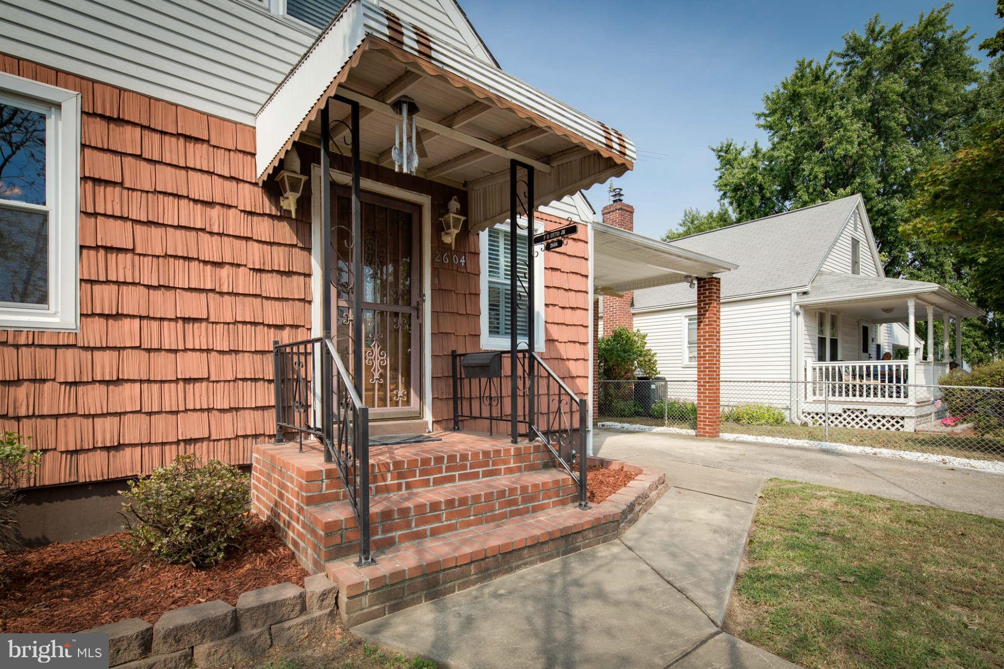 2604 Lynbrook Road Baltimore, MD 21222 - Photo 3 of 30 a front view of a house with a porch