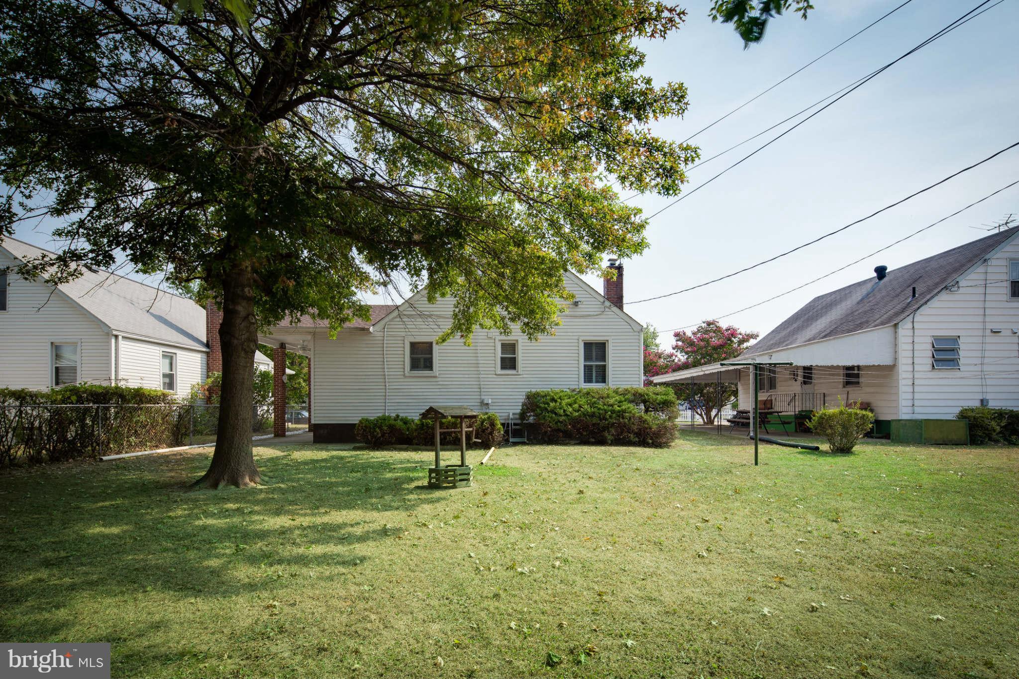 2604 Lynbrook Road Baltimore, MD 21222 - Photo 27 of 30 a view of a yard in front of a house