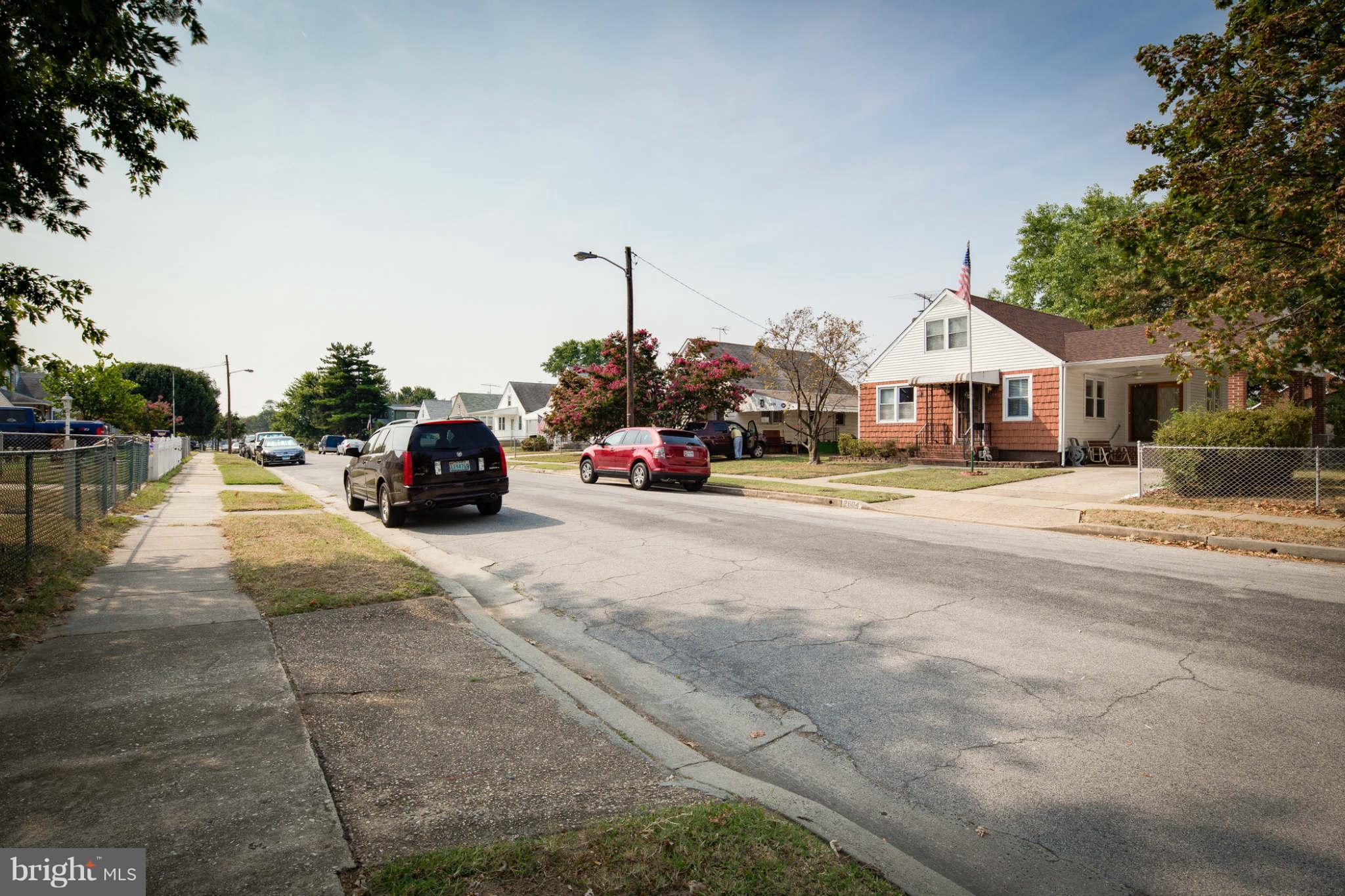 2604 Lynbrook Road Baltimore, MD 21222 - Photo 29 of 30 a view of street with parked cars