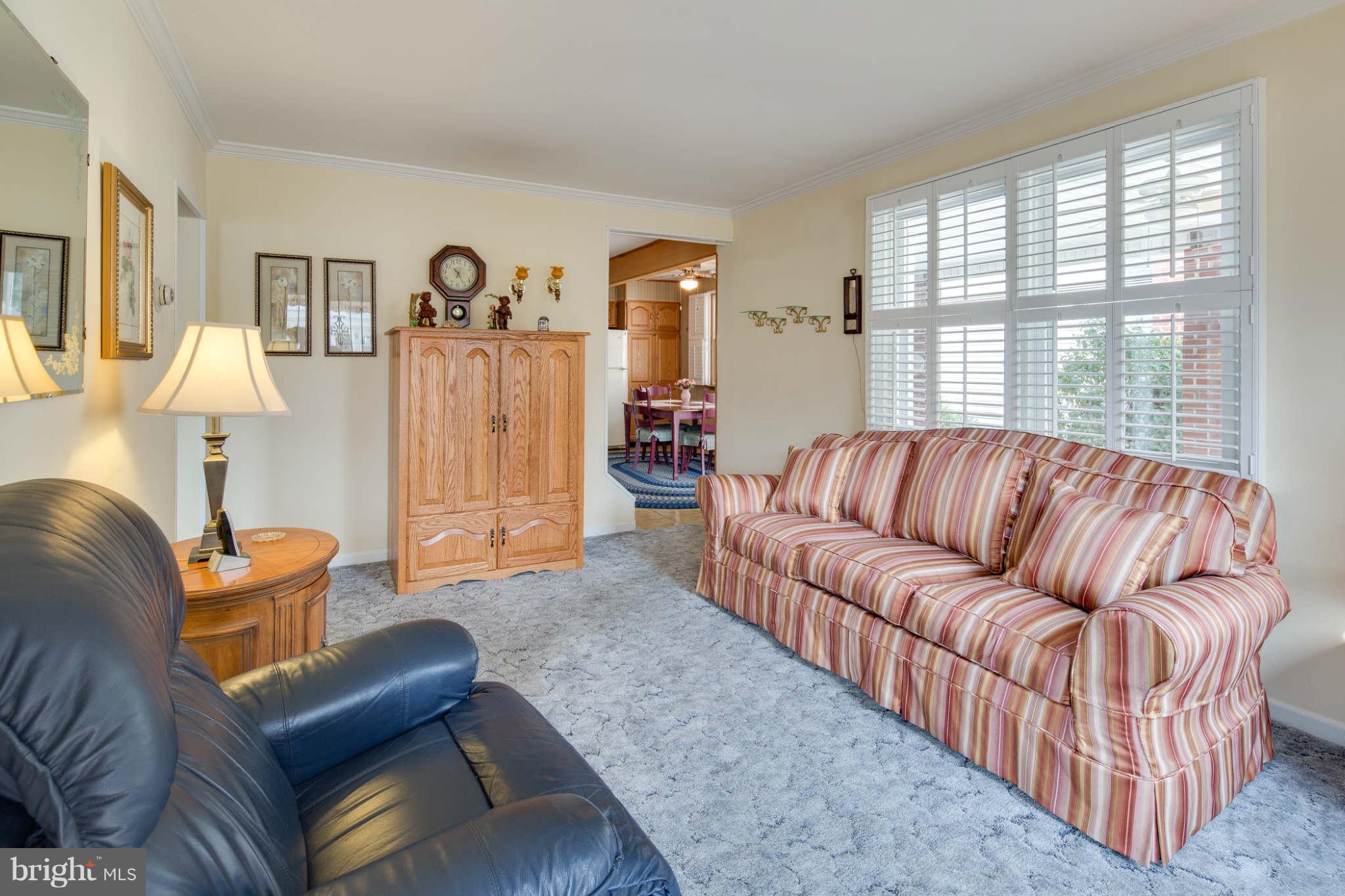 2604 Lynbrook Road Baltimore, MD 21222 - Photo 5 of 30 a living room with furniture and a large window