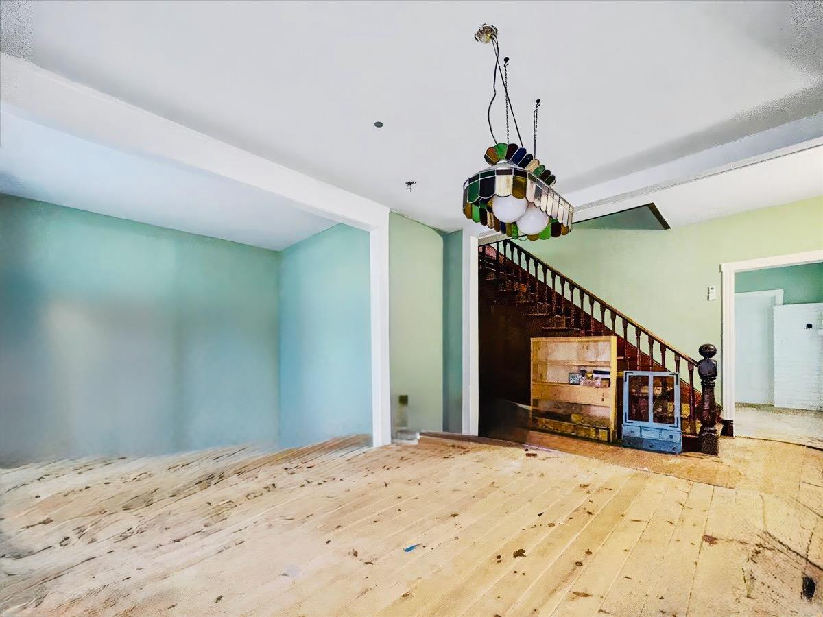 30 Station Hill Road Ferndale, NY 12734 - Photo 7 of 27 a bedroom with a bed and a chandelier