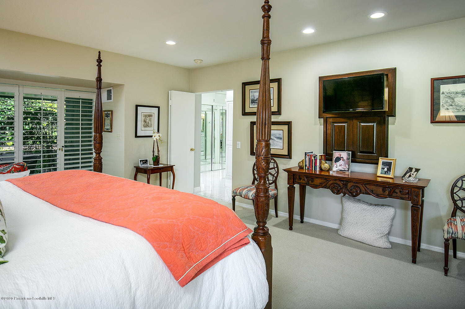 600 Busch Place Pasadena, CA 91105 - Photo 21 of 47 a bedroom with a bed and a flat screen tv