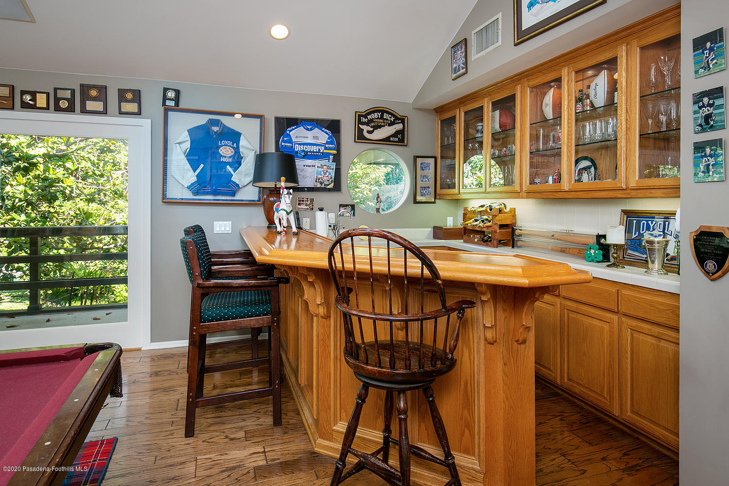 600 Busch Place Pasadena, CA 91105 - Photo 30 of 47 a view of a dining room with furniture window and wooden floor