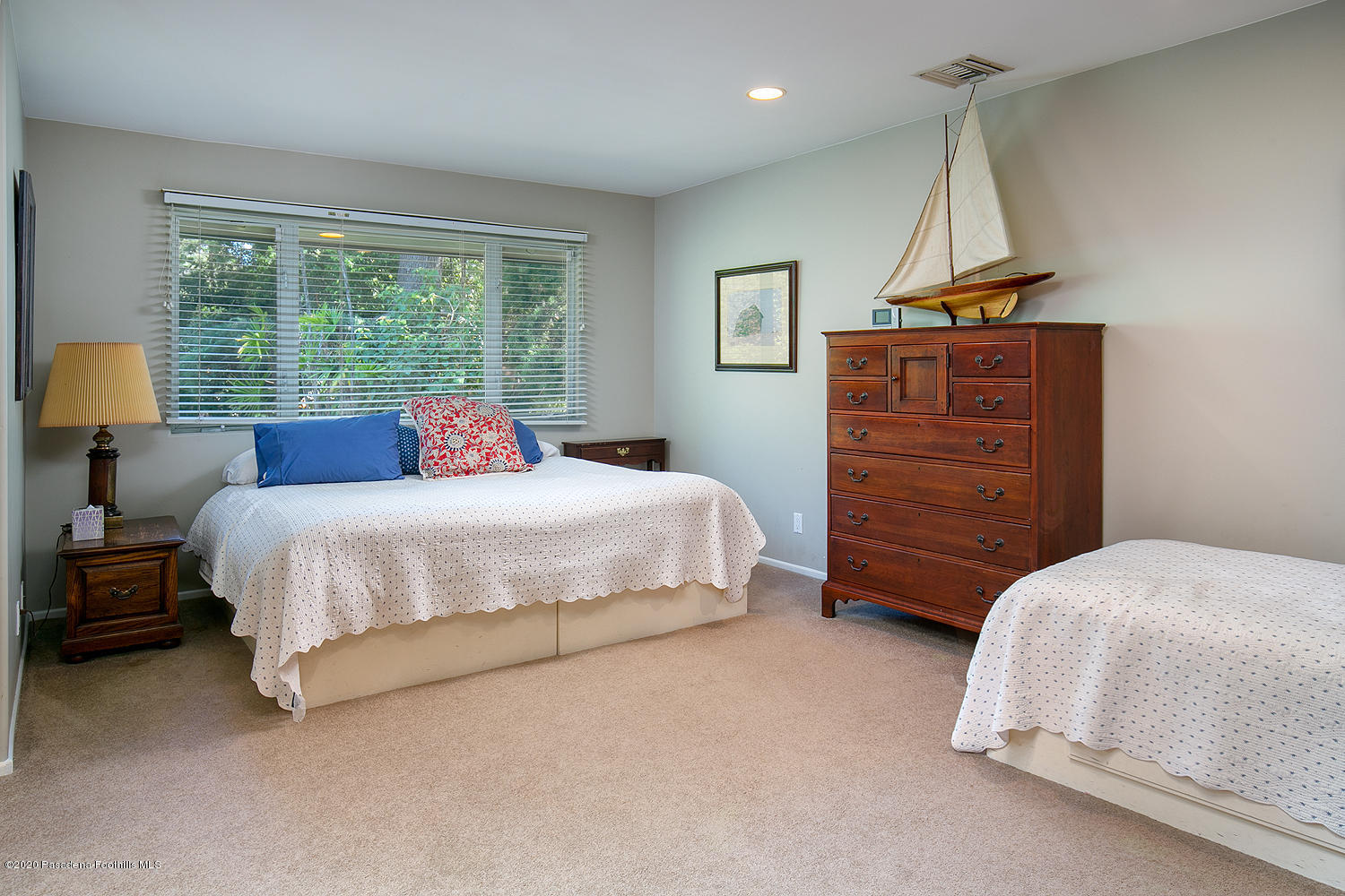 600 Busch Place Pasadena, CA 91105 - Photo 31 of 47 a bedroom with a bed a lamp and a large window