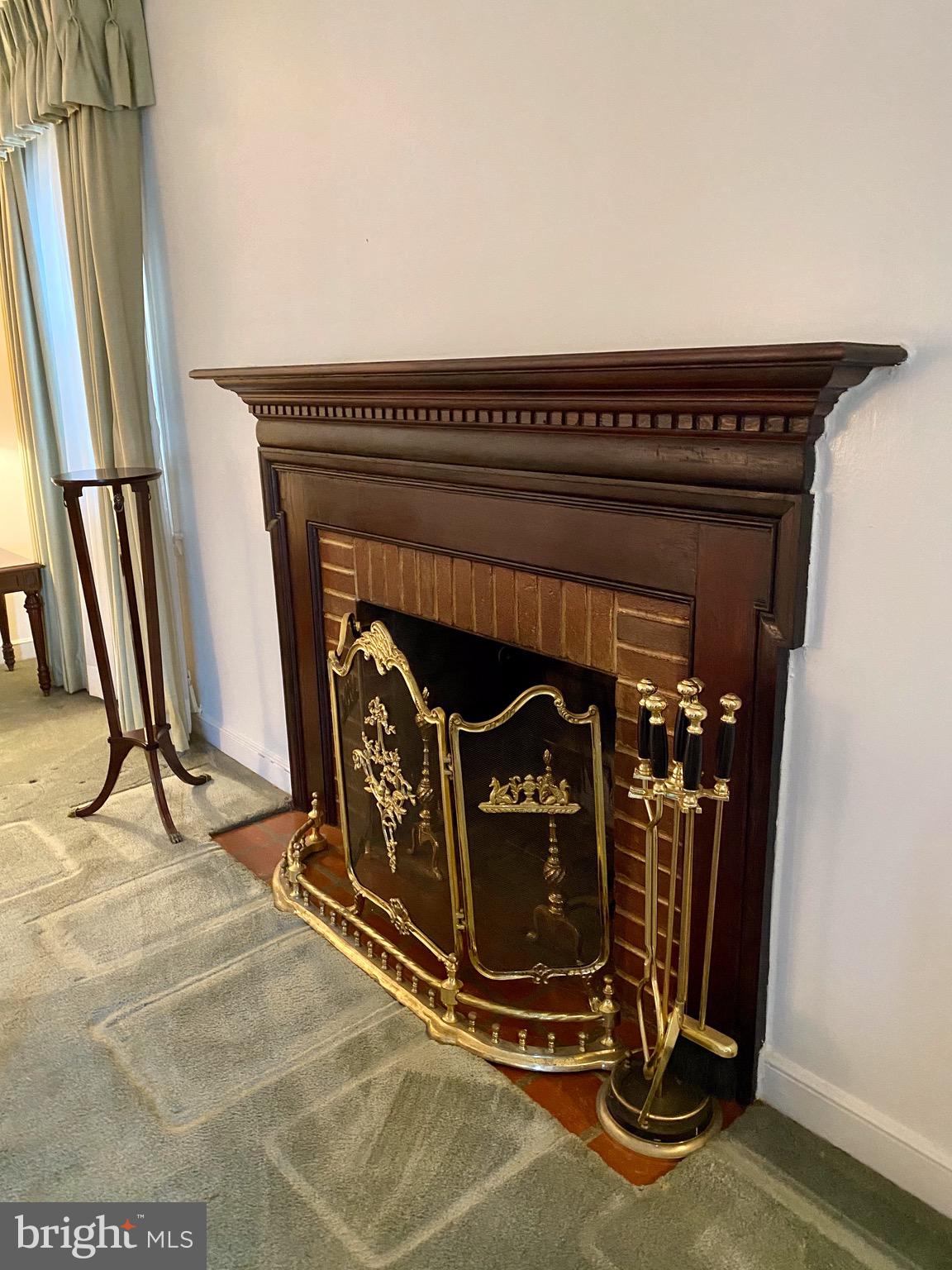 30 Dewey Road Cheltenham, PA 19012 - Photo 7 of 40 Fireplace with wood mantel and tiled surround