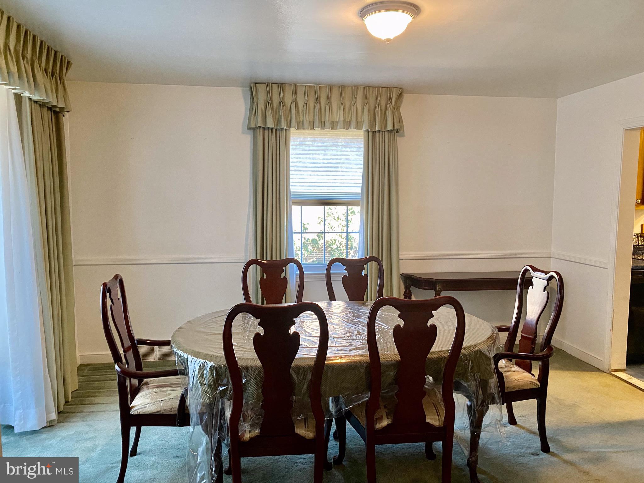 30 Dewey Road Cheltenham, PA 19012 - Photo 9 of 40 Dining room with chair rail, carpeting over W/F