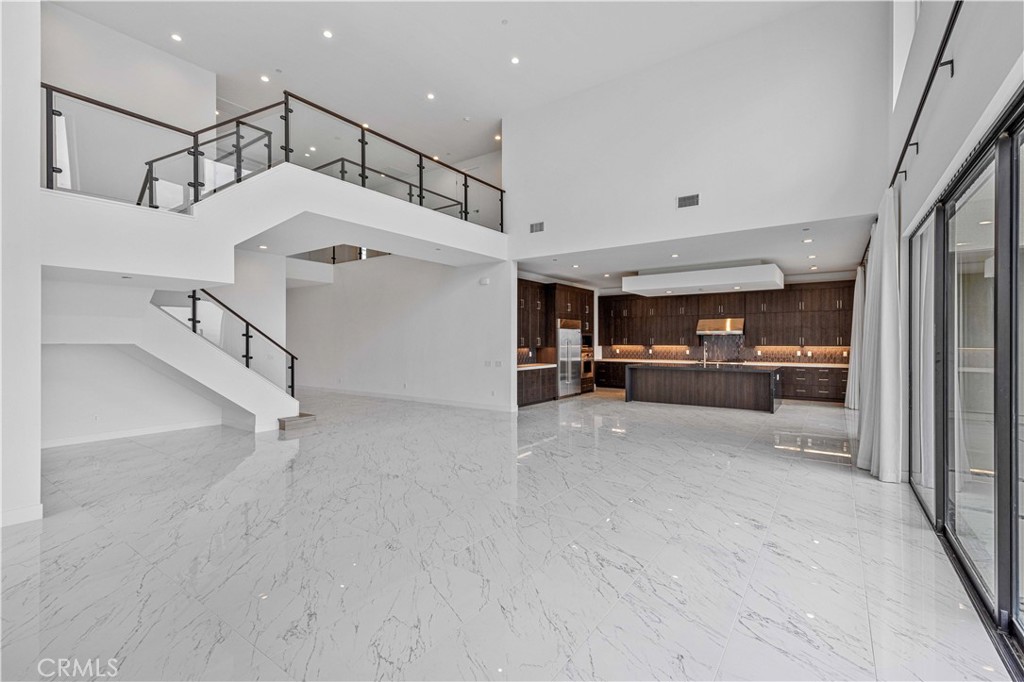 11752 Hillsborough Lane Porter Ranch, CA 91326 - Photo 8 of 45 a view of a kitchen with furniture and a kitchen