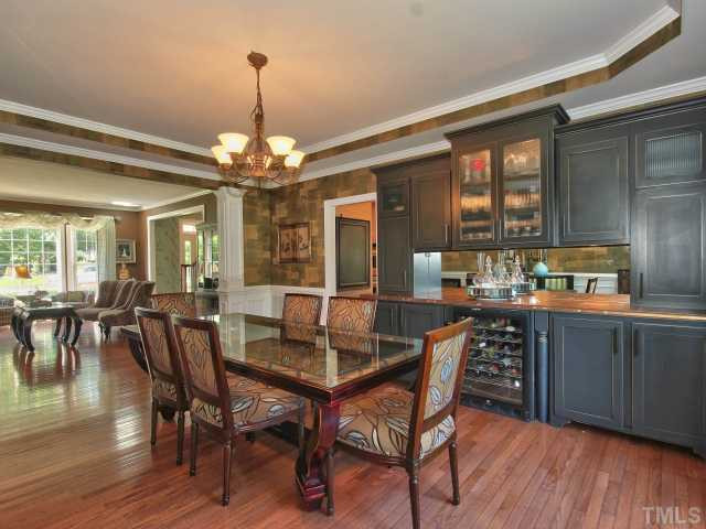 1817 Wescott Drive Raleigh, NC 27614 - Photo 4 of 25 Stunning, spacious dining room with hardwood floors, trey ceiling and wainscoting. Great place to entertain family and friends! Dining Room
