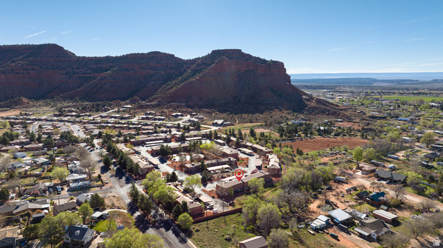 6 300th Road North, Unit I6 Kanab, UT 84741 - Photo 4 of 37 Aerial perspective of suburban area featuring mountains