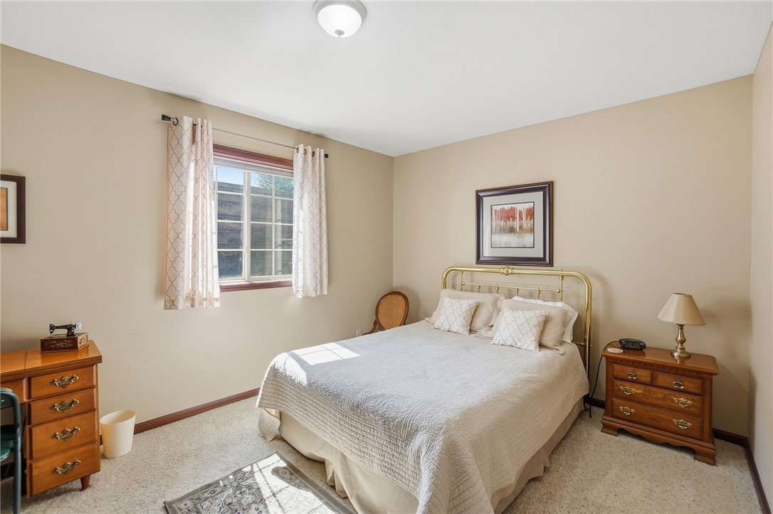 710 Governors Road Troy, OH 45373 - Photo 40 of 56 This cozy bedroom features a bright window and comfortable flooring, perfect for rest.