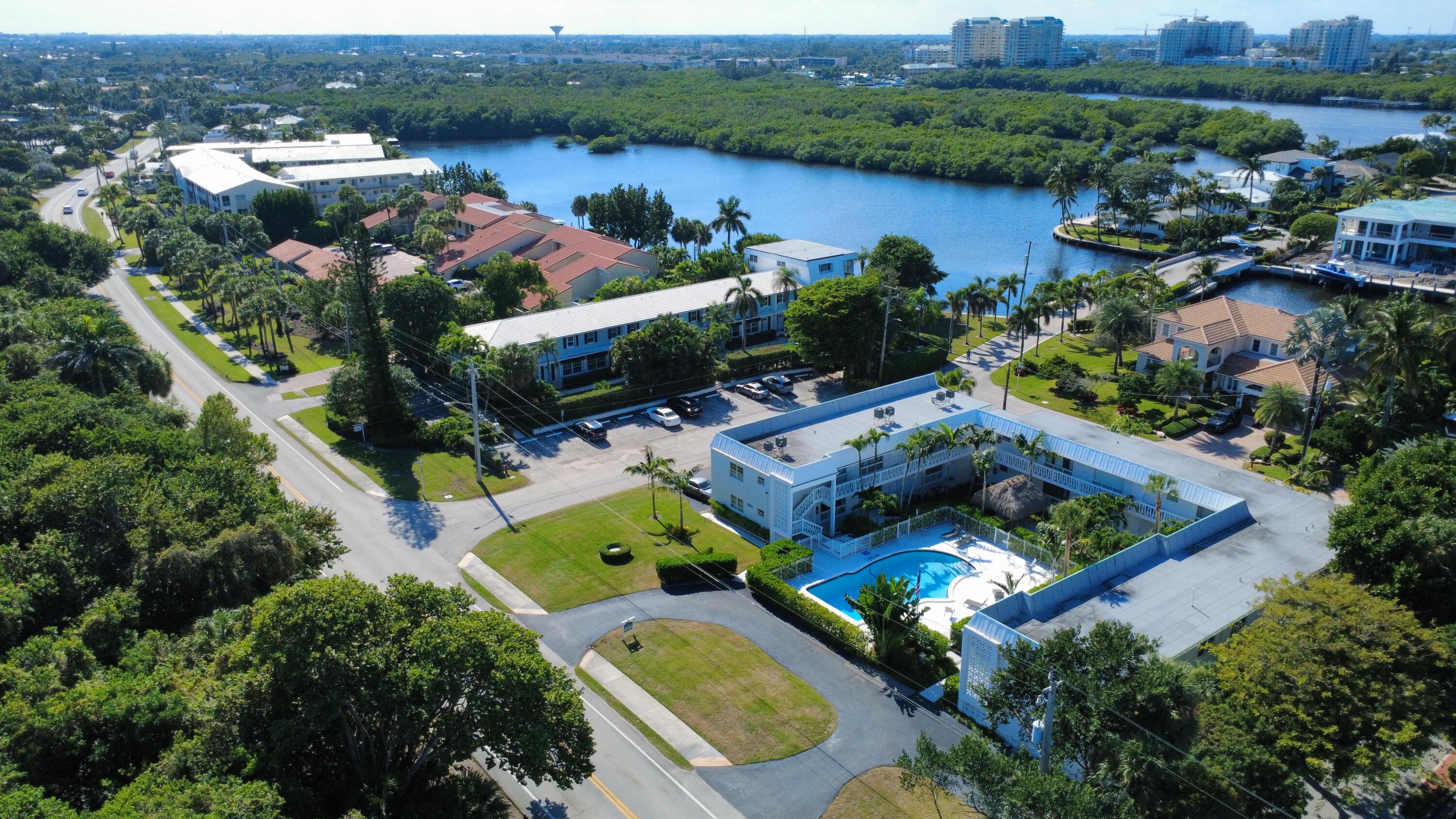 6600 North Ocean Boulevard, Unit 17 Ocean Ridge, FL 33435 - Photo 5 of 21 an aerial view of house with yard swimming pool and outdoor seating