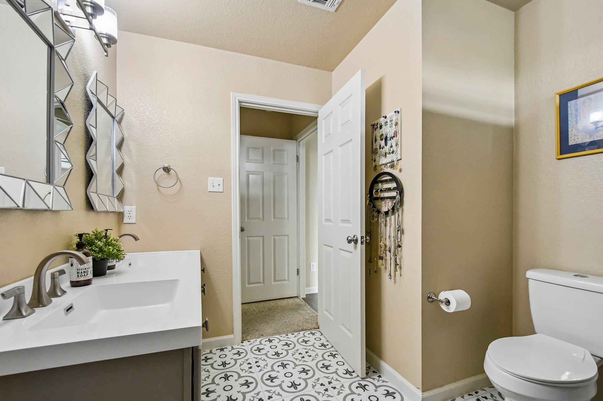 125 Mason Reed Cove Kyle, TX 78640 - Photo 29 of 39 a bathroom with a sink a toilet and shower