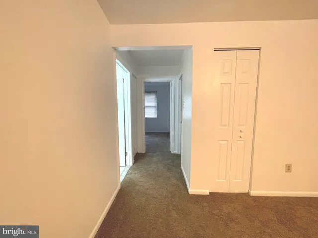 a bathroom with a sink mirror toilet and bathtub