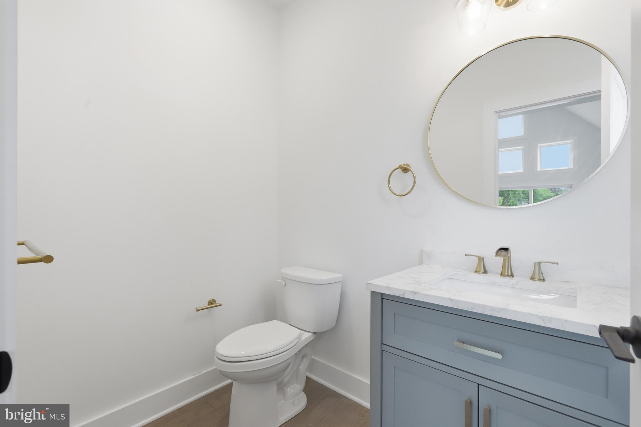 759 River Road Erwinna, PA 18920 - Photo 19 of 46 a bathroom with a toilet sink and mirror