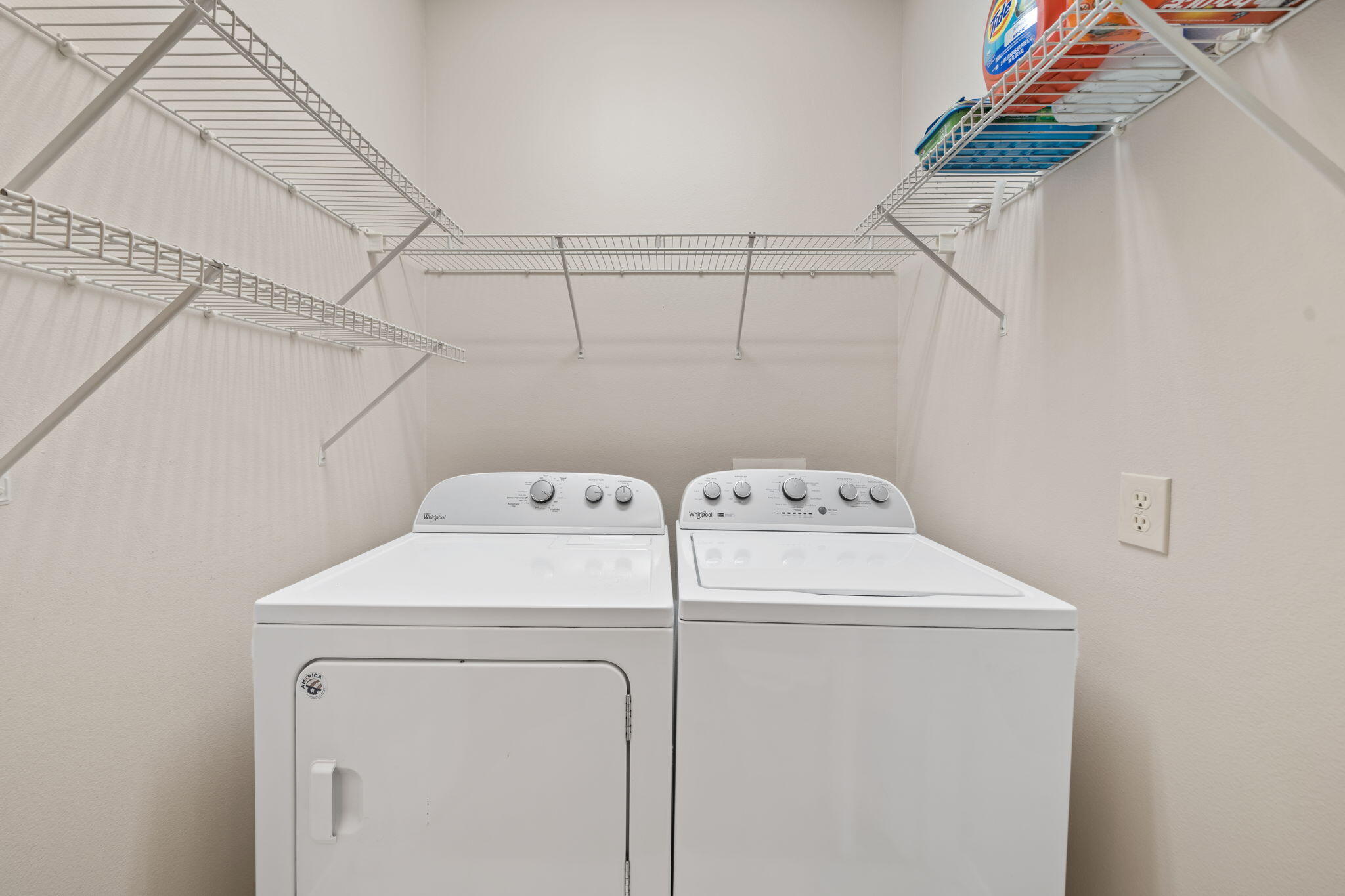 229 Inverrary Drive Destin, FL 32541 - Photo 16 of 35 a utility room with dryer and washer