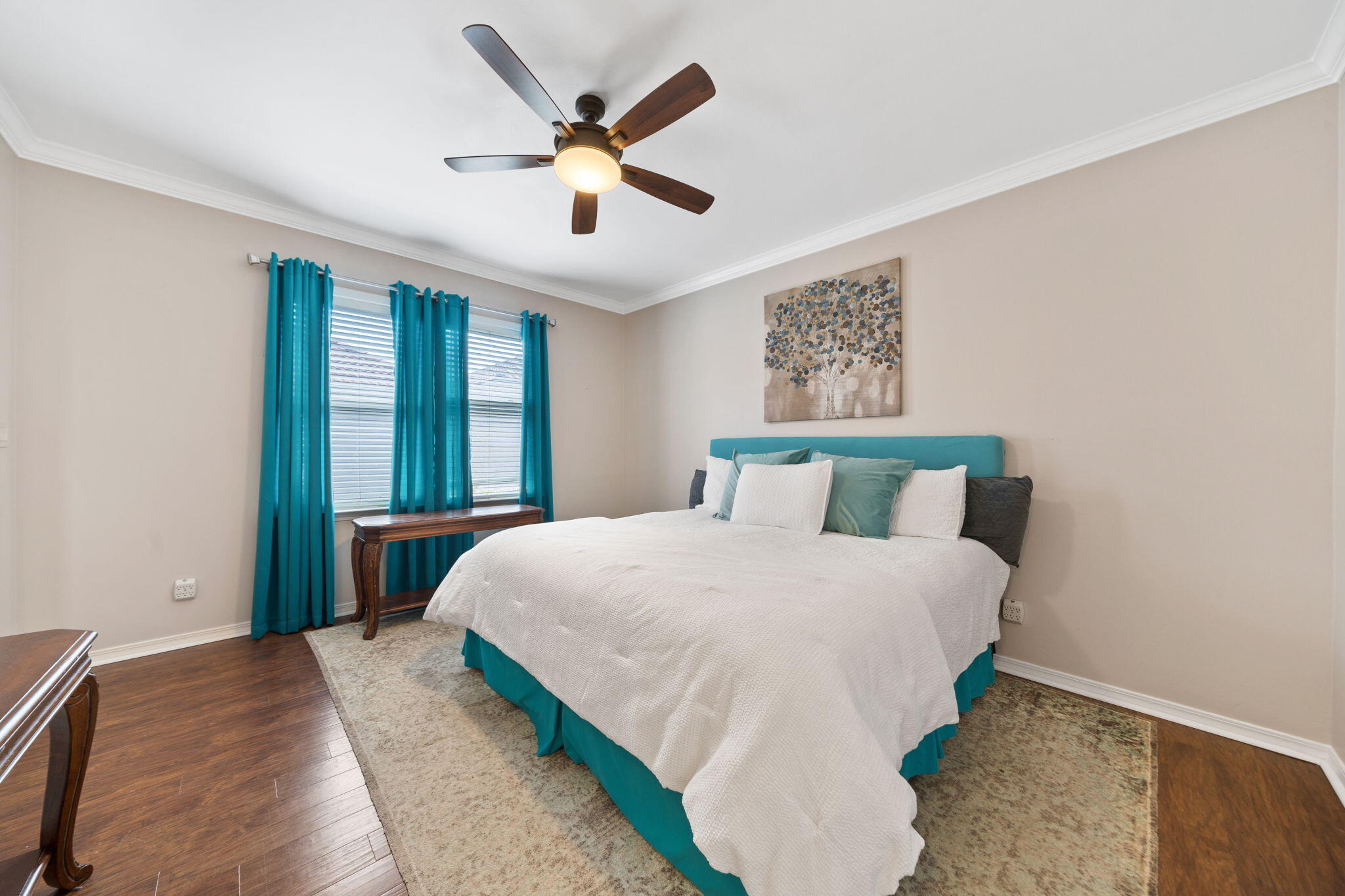229 Inverrary Drive Destin, FL 32541 - Photo 17 of 35 a bedroom with a large bed and a large window