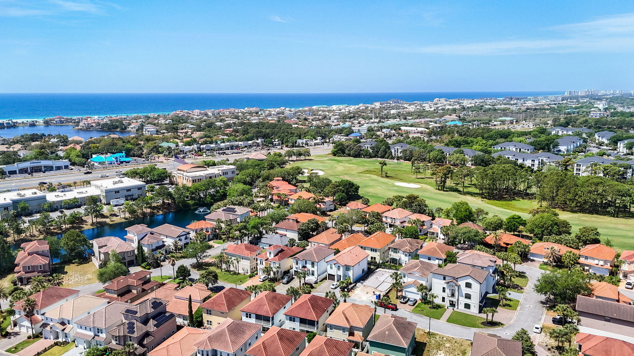 229 Inverrary Drive Destin, FL 32541 - Photo 2 of 35 an aerial view of a city with lots of residential buildings