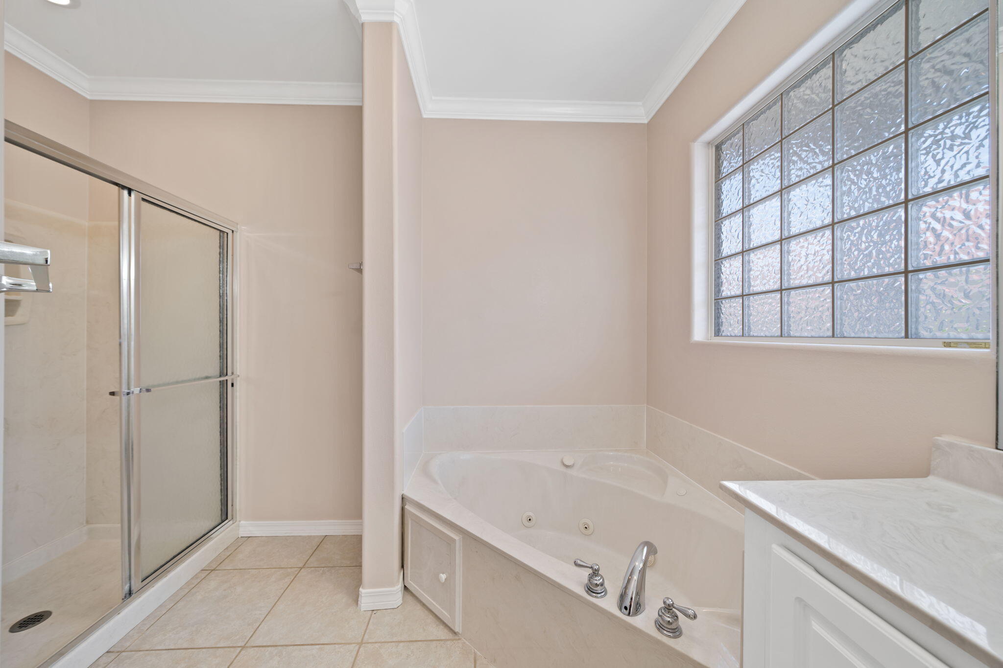 229 Inverrary Drive Destin, FL 32541 - Photo 21 of 35 a bathroom with a bathtub and a sink