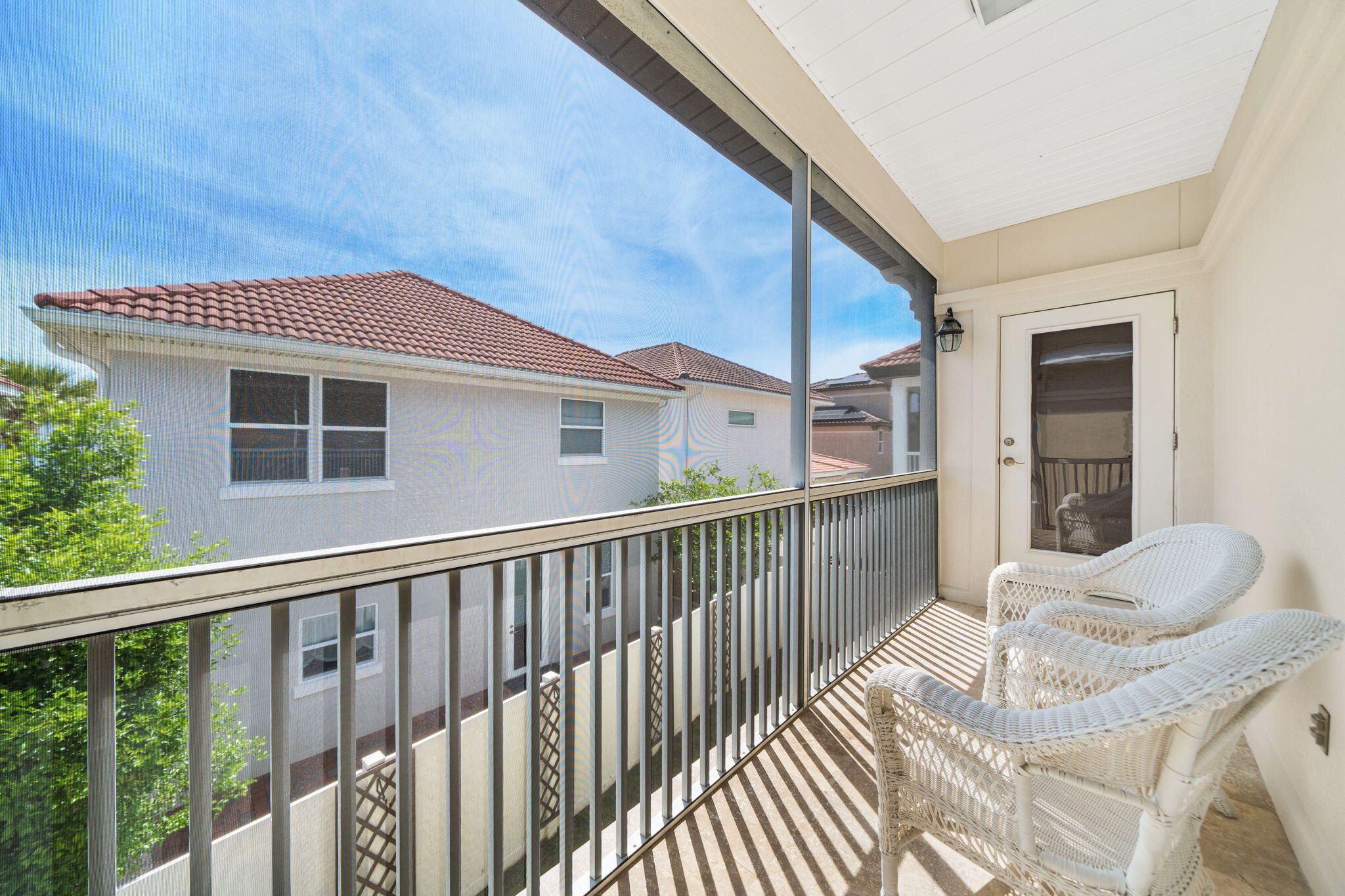 229 Inverrary Drive Destin, FL 32541 - Photo 24 of 35 a view of a chair and table in the balcony