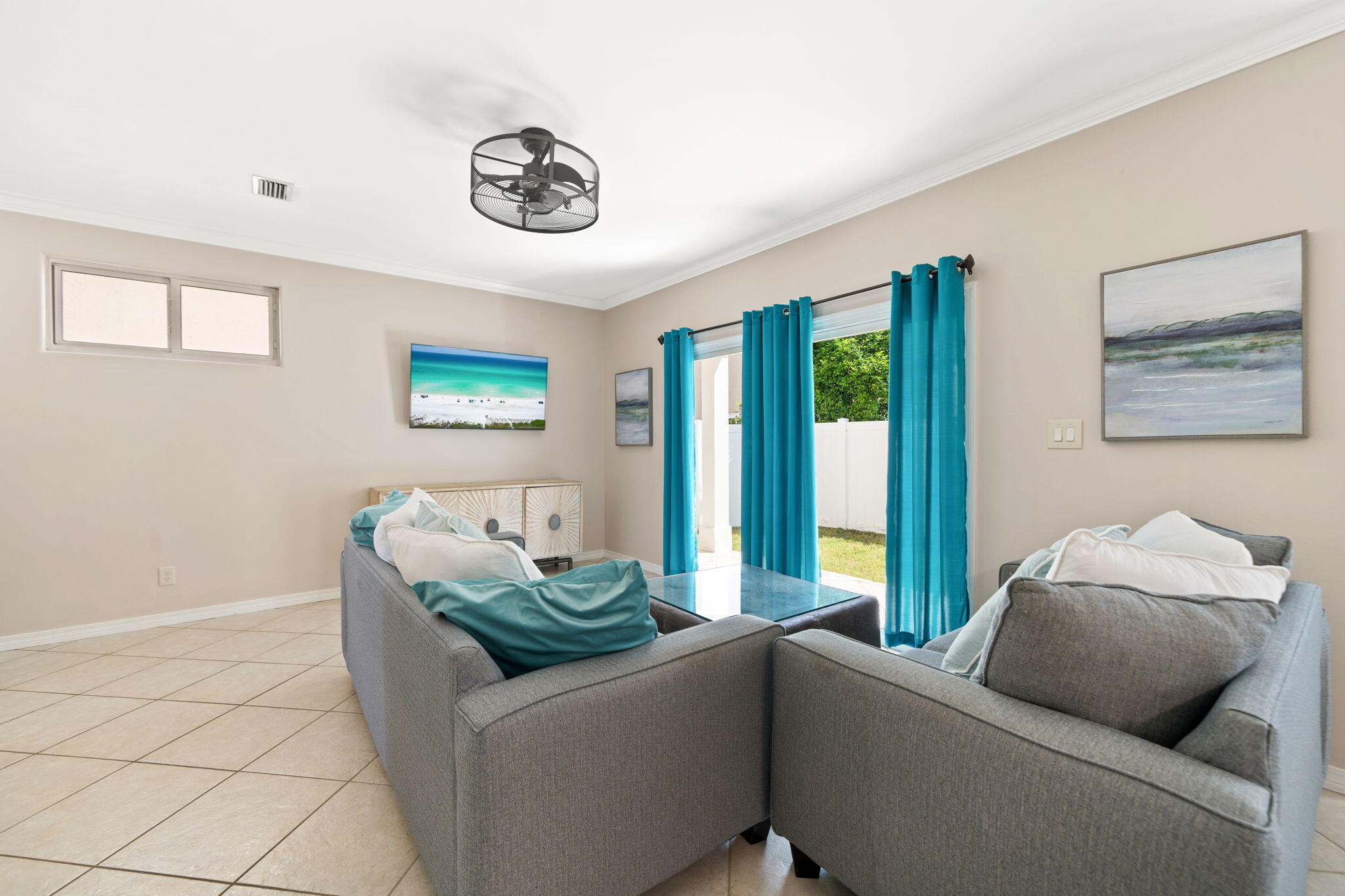 229 Inverrary Drive Destin, FL 32541 - Photo 10 of 35 a living room with furniture and a large window