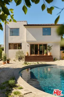 a view of pool with outdoor seating