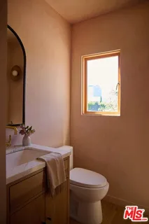a bathroom with a sink and a toilet