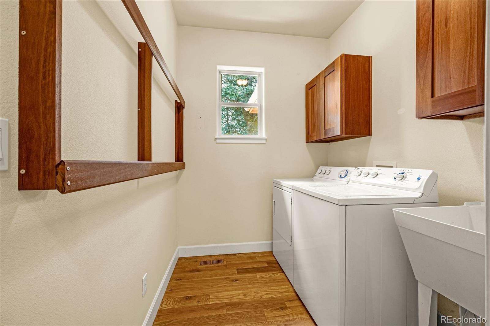 4775 Neeper Valley Road Manitou Springs, CO 80829 - Photo 19 of 41 a utility room with dryer and washer