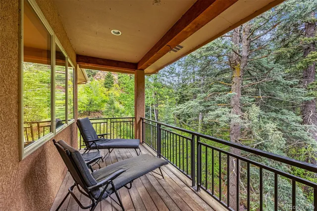 a view of a two chair in the balcony