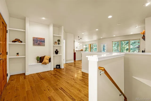 a very nice looking living room with a large window
