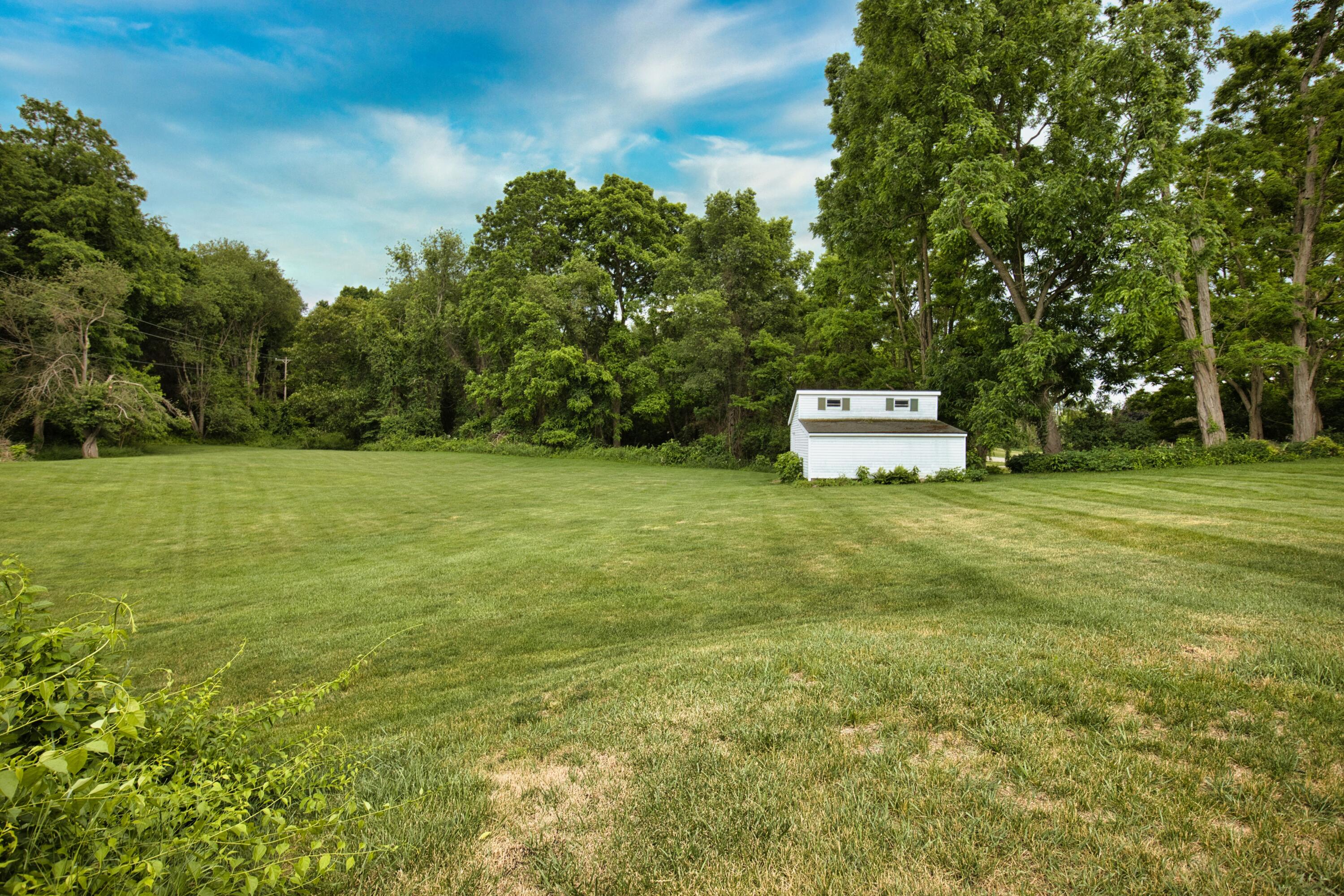8045 Chilson Road Pinckney, MI 48169 - Photo 4 of 22 Field behind