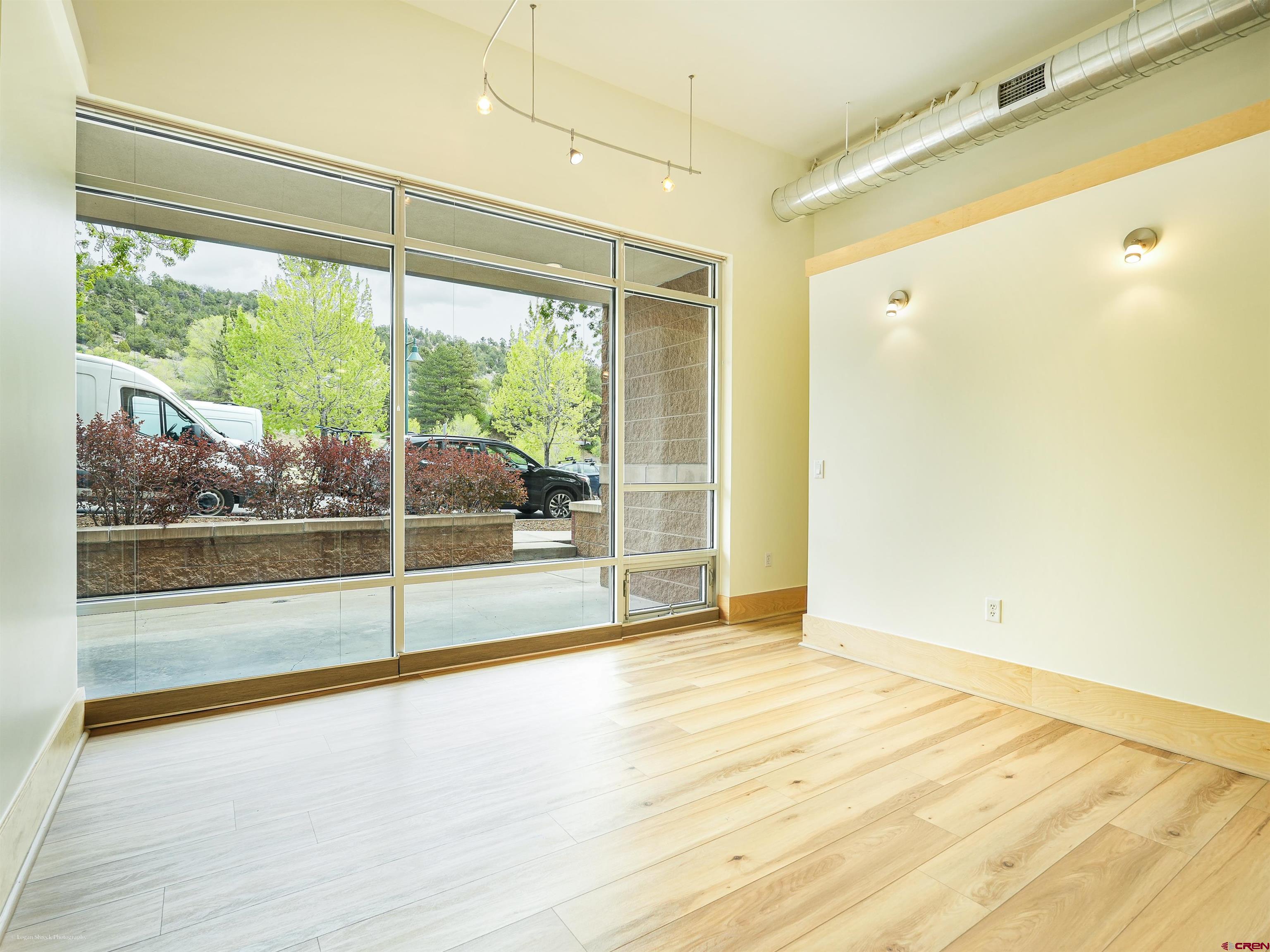555 Rivergate Lane, Unit B2139 Durango, CO 81301 - Photo 16 of 32 a view of empty room with wooden floor and fan