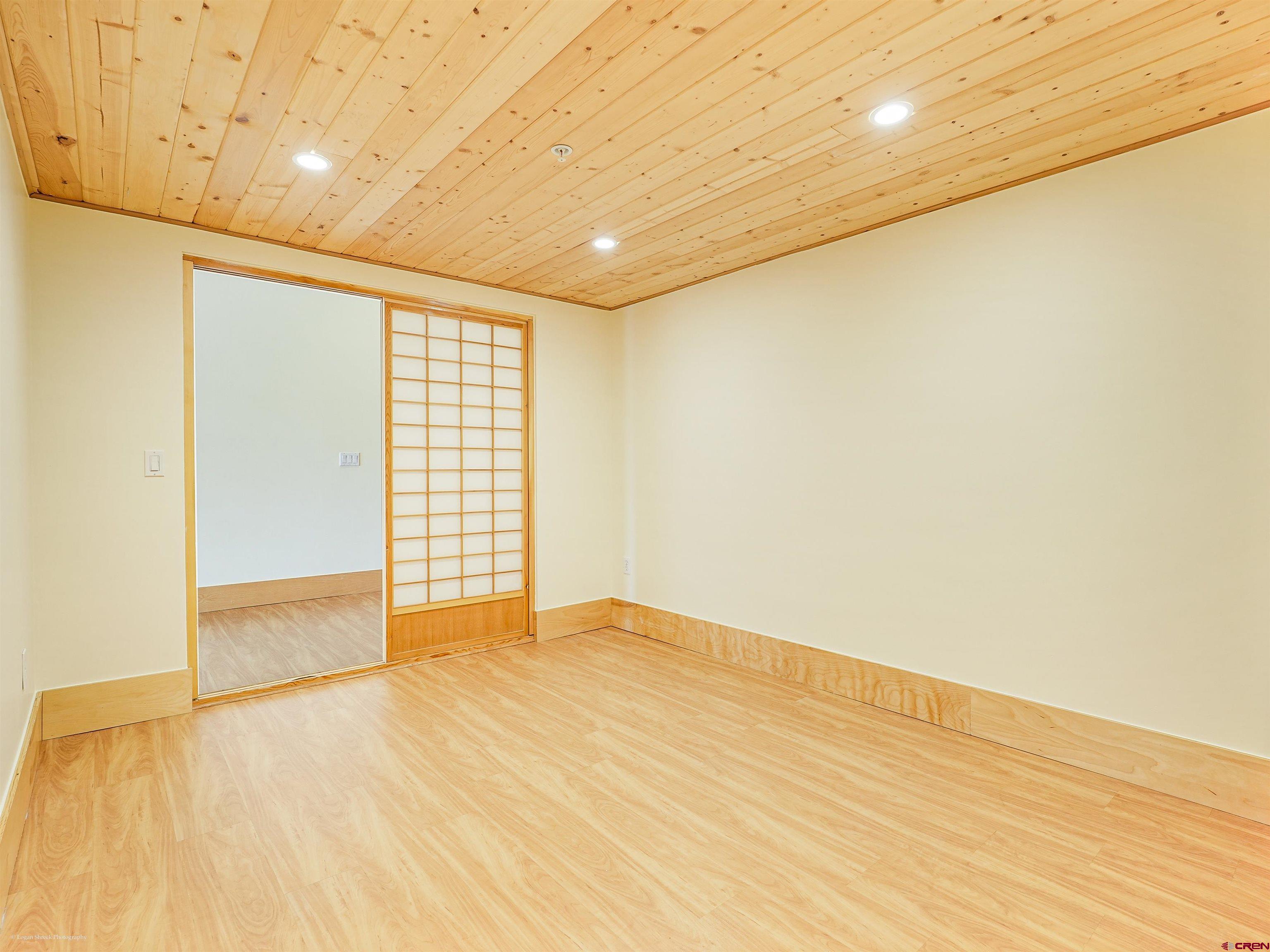 555 Rivergate Lane, Unit B2139 Durango, CO 81301 - Photo 22 of 32 a view of an empty room with wooden floor