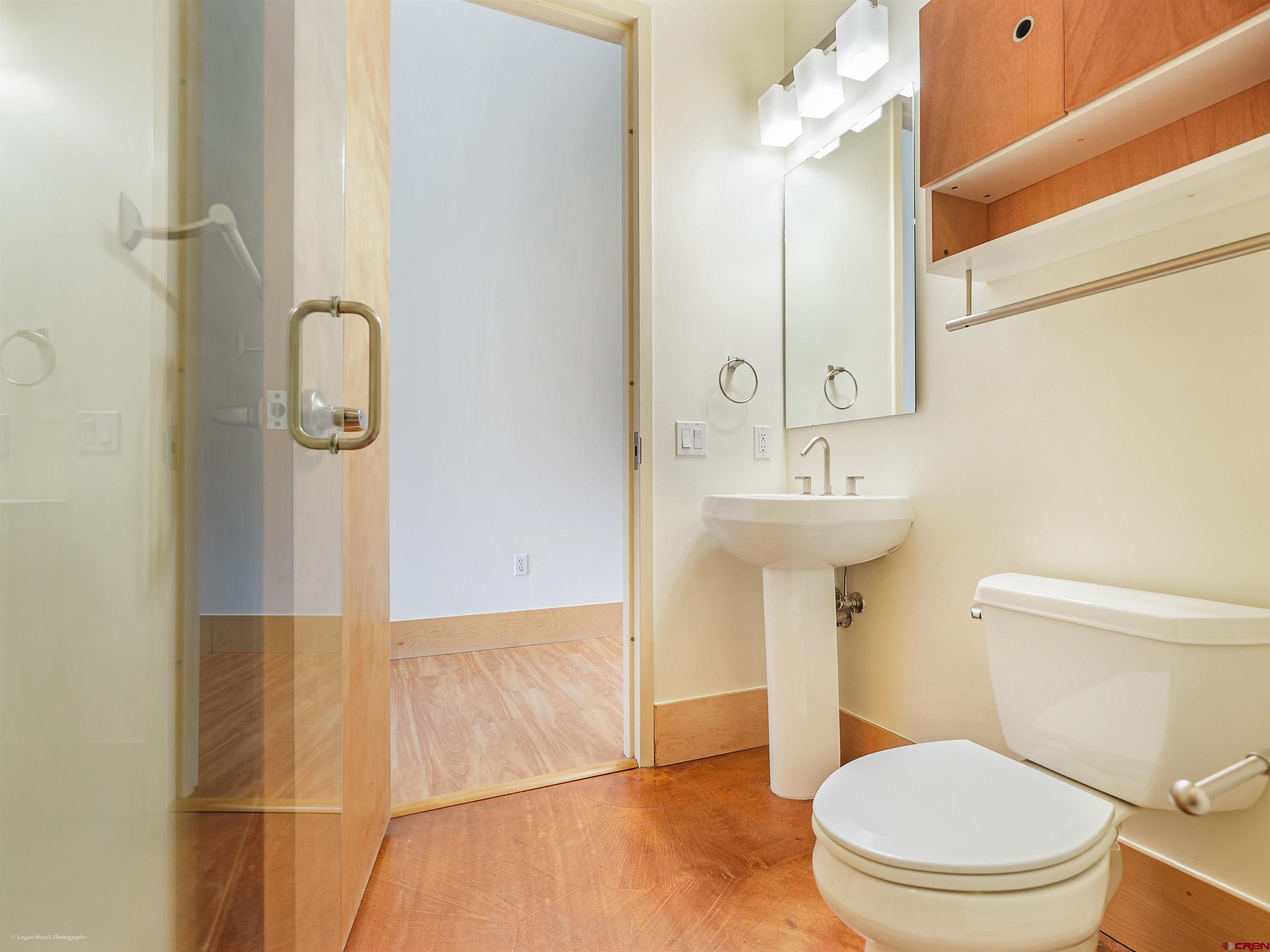 555 Rivergate Lane, Unit B2139 Durango, CO 81301 - Photo 25 of 32 a bathroom with a sink a toilet and shower
